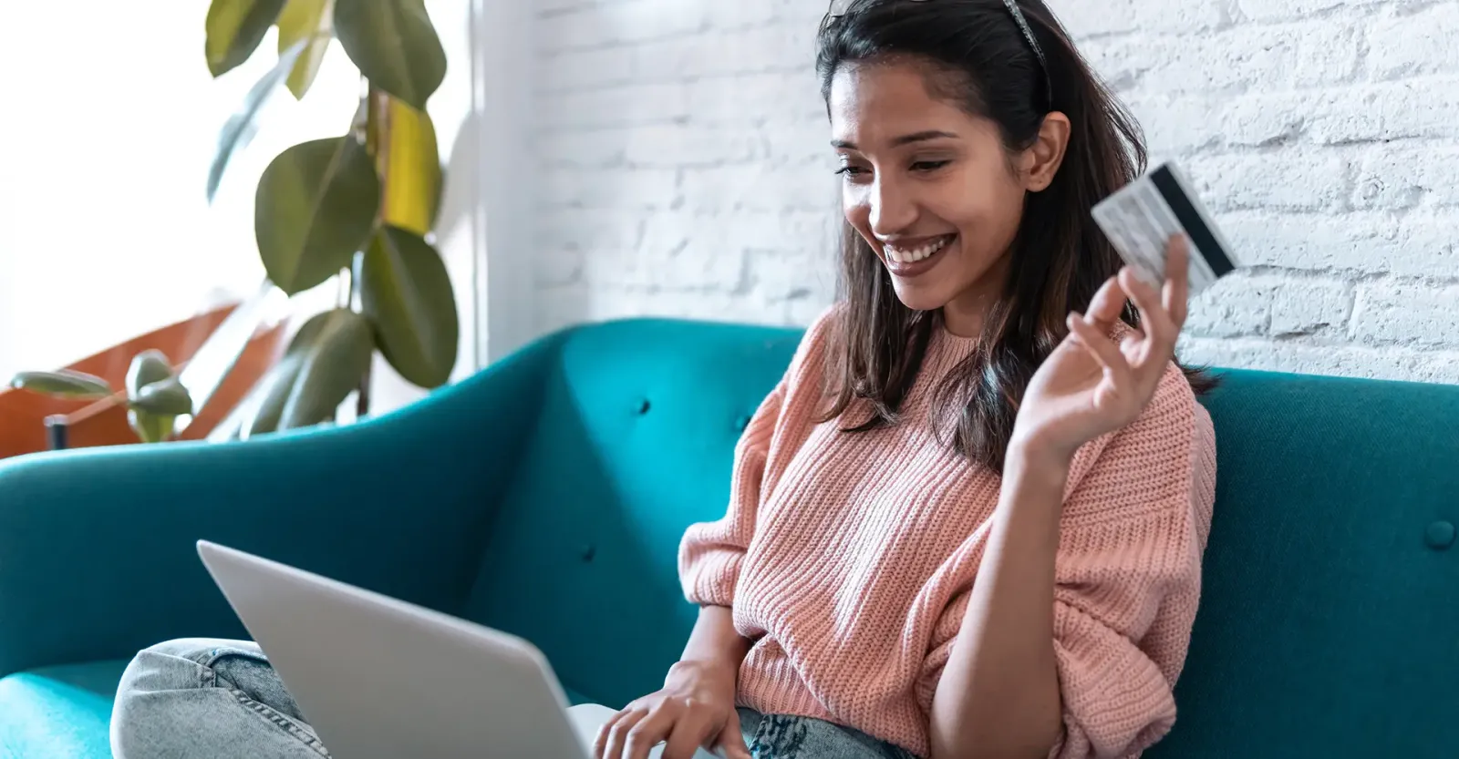woman holding credit card